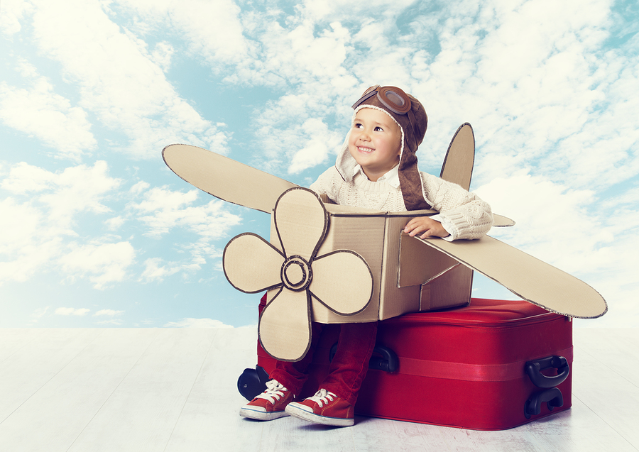 bigstock-Little-Child-Playing-Airplane--85445417.jpg